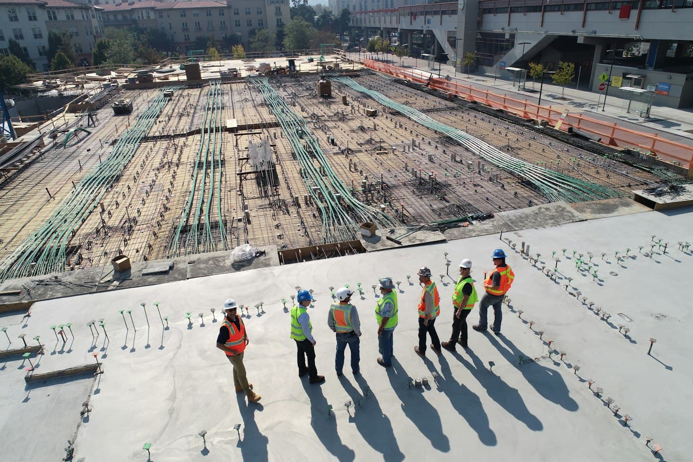 Construction team reviewing a live building site